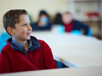 KidsCan-Henderson-Intermediate-Boy-1-Smiling